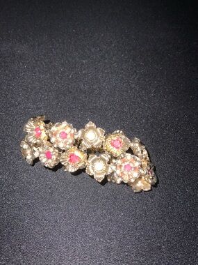 Gold Floral Bracelet with Pink Accent Stones